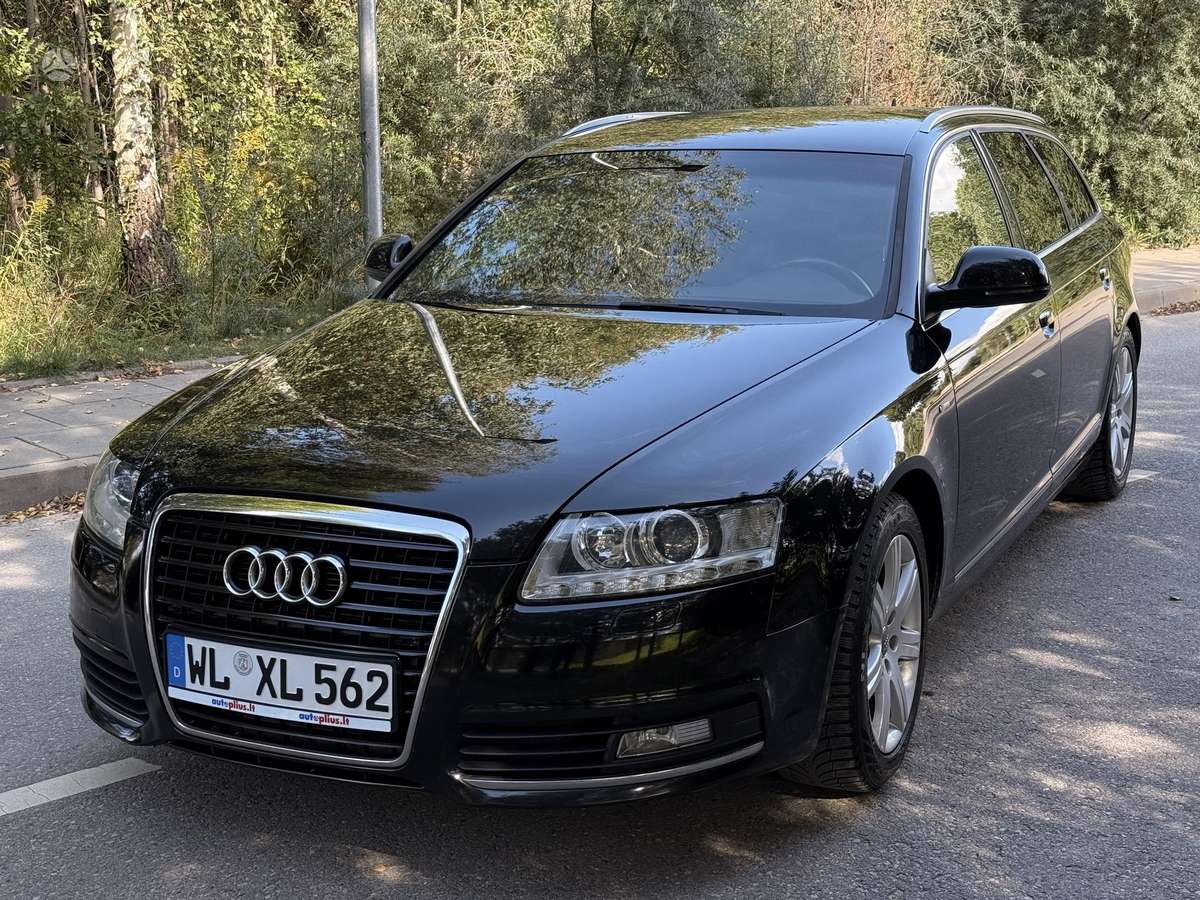 Audi A6 2011 — салон