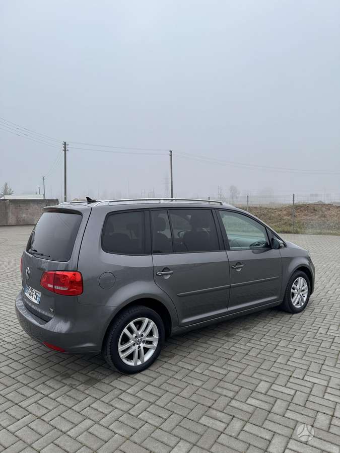 Volkswagen Touran 2014 — engine 1598 cm³, 105 HP (77kW)