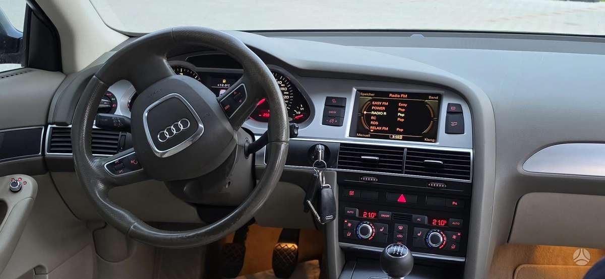 Audi A6 2009 — photo 13