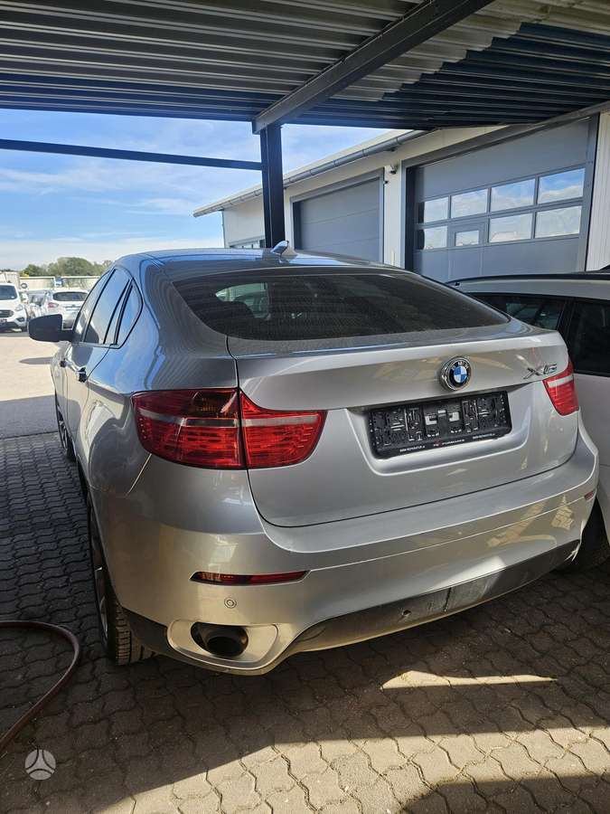 BMW X6 2009 — engine 2998 cm³, 235 HP (173kW)