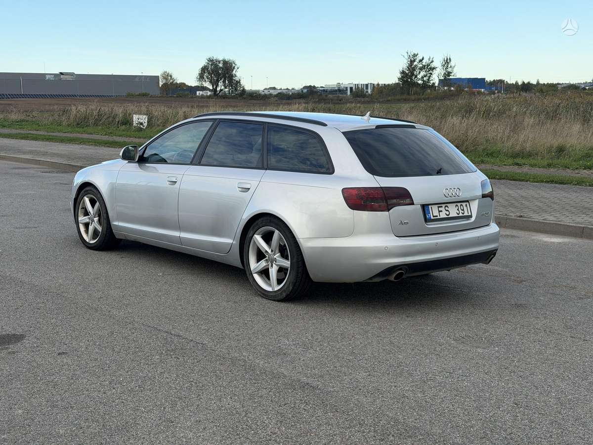 Audi A6 2009 — engine 2967 cm³, 239 HP (176kW)