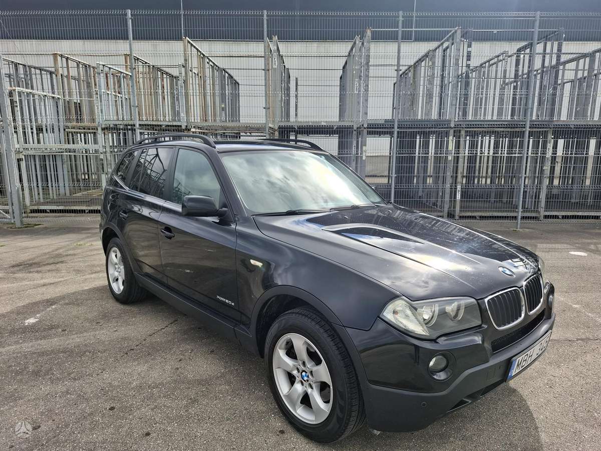 BMW X3 2009 — rear view