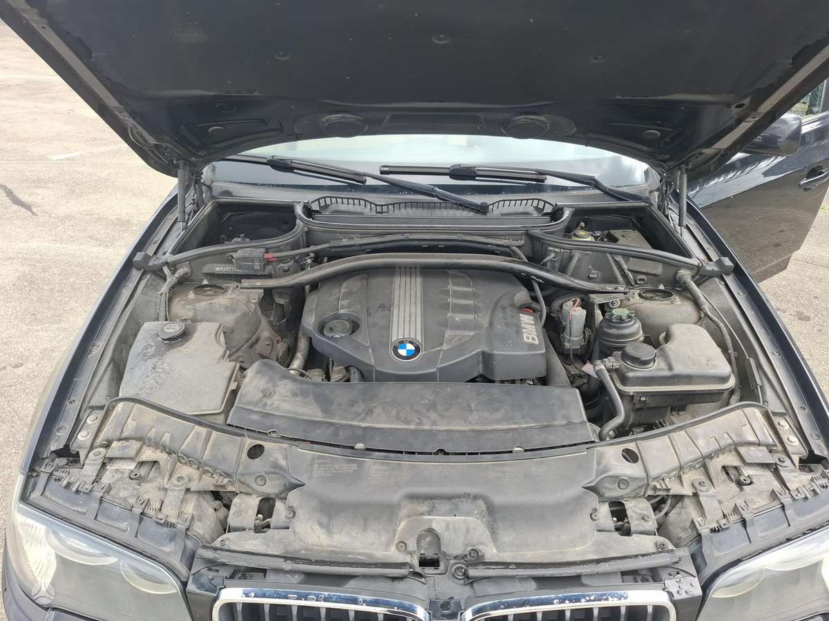 BMW X3 2009 — interior