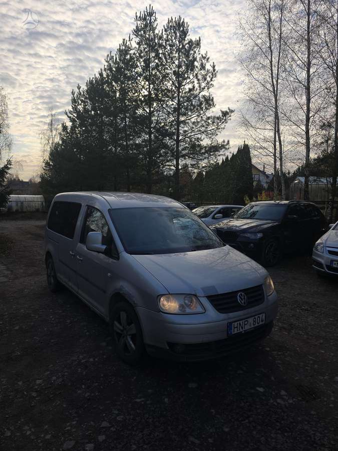 Volkswagen Caddy 2010 — engine 2000 cm³, 105 HP (77kW)