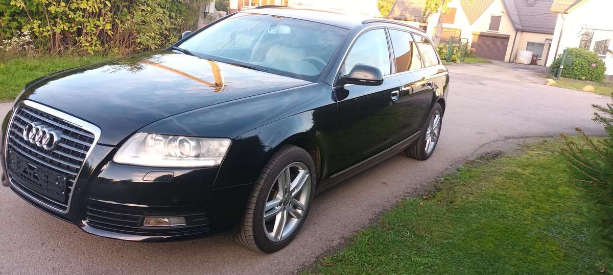 Audi A6 2009 — салон