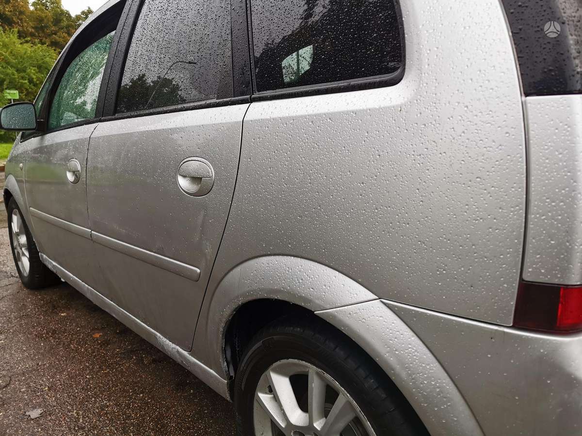 Opel Meriva 2009 — photo 12