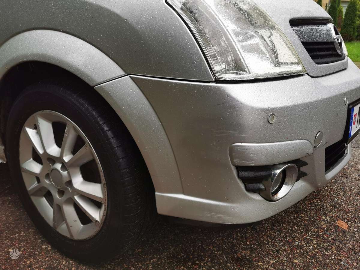 Opel Meriva 2009 — photo 26