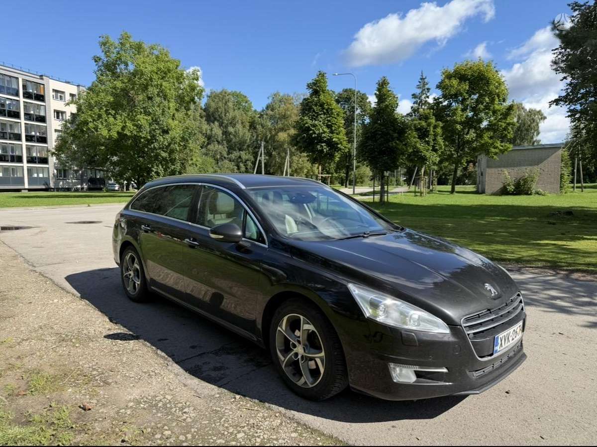 Peugeot 508 2013 — photo 16