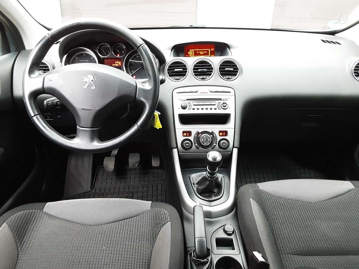 Peugeot 308 2011 — photo 11