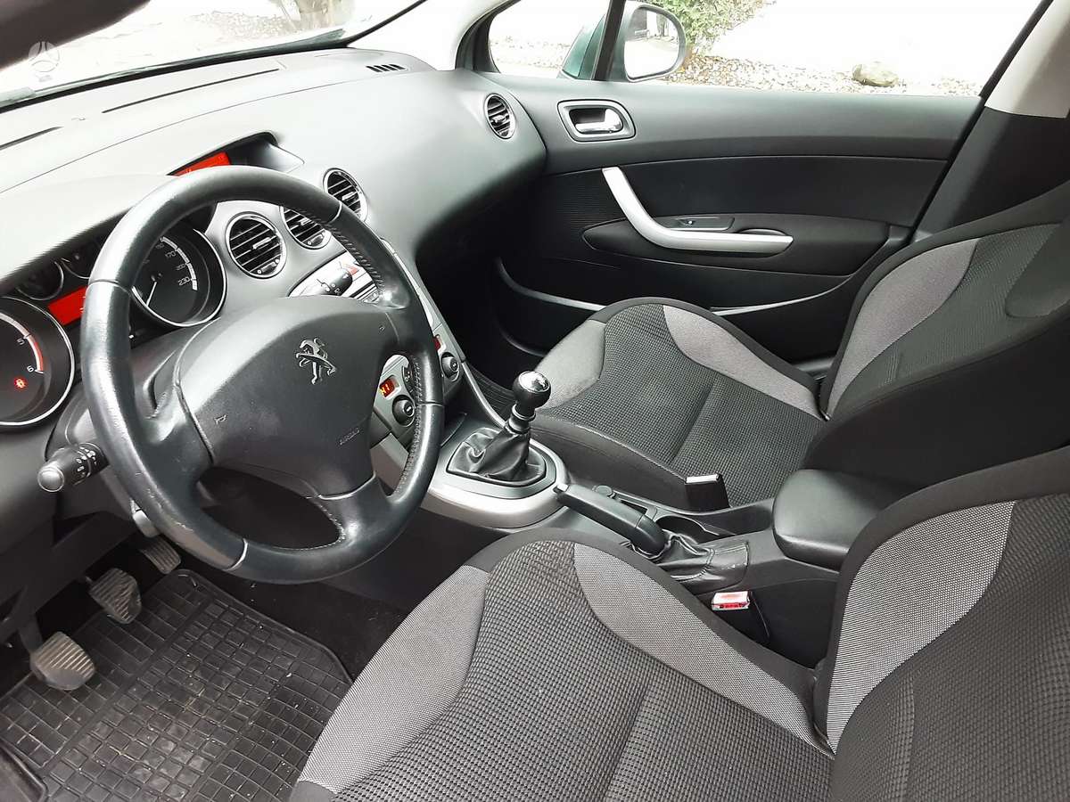 Peugeot 308 2011 — photo 16