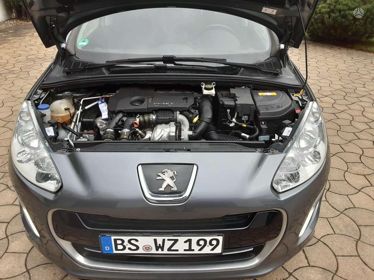 Peugeot 308 2011 — photo 21