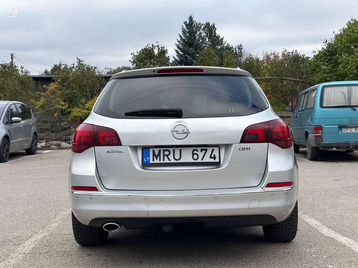 Opel Astra 2013 — engine 1956 cm³, 165 HP (121kW)