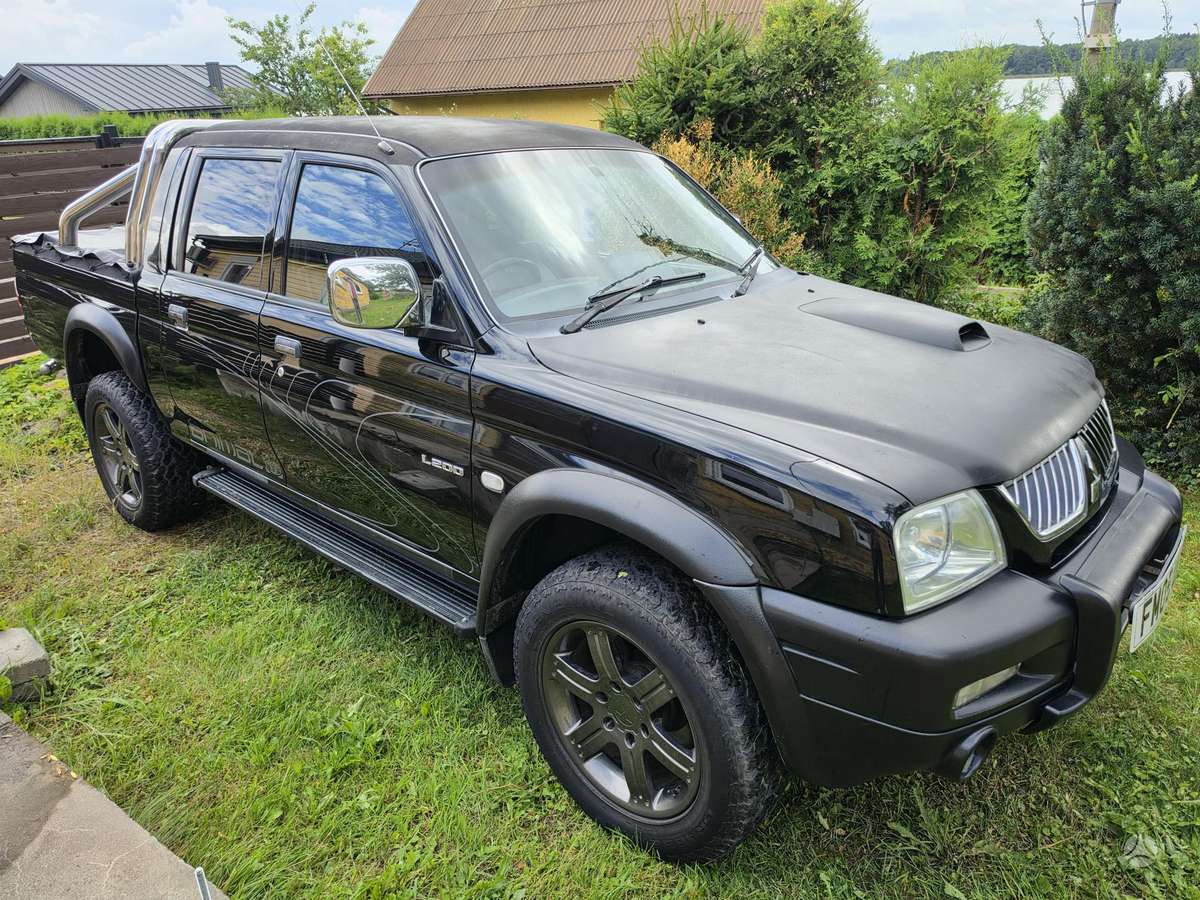 Mitsubishi L200 2008 — photo 11
