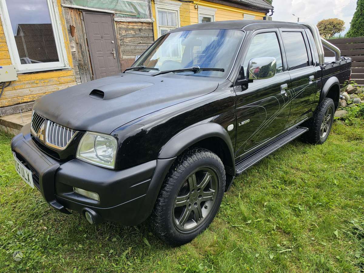 Mitsubishi L200 2008 — photo 12