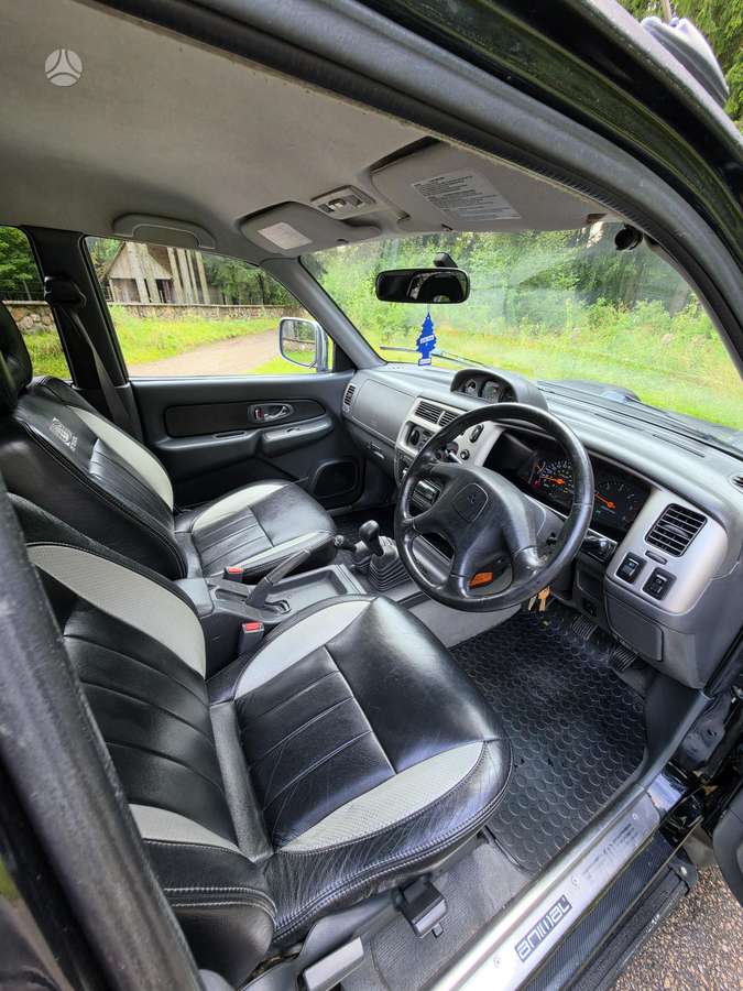 Mitsubishi L200 2008 — photo 13