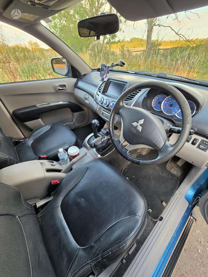 Mitsubishi L200 2008 — photo 6