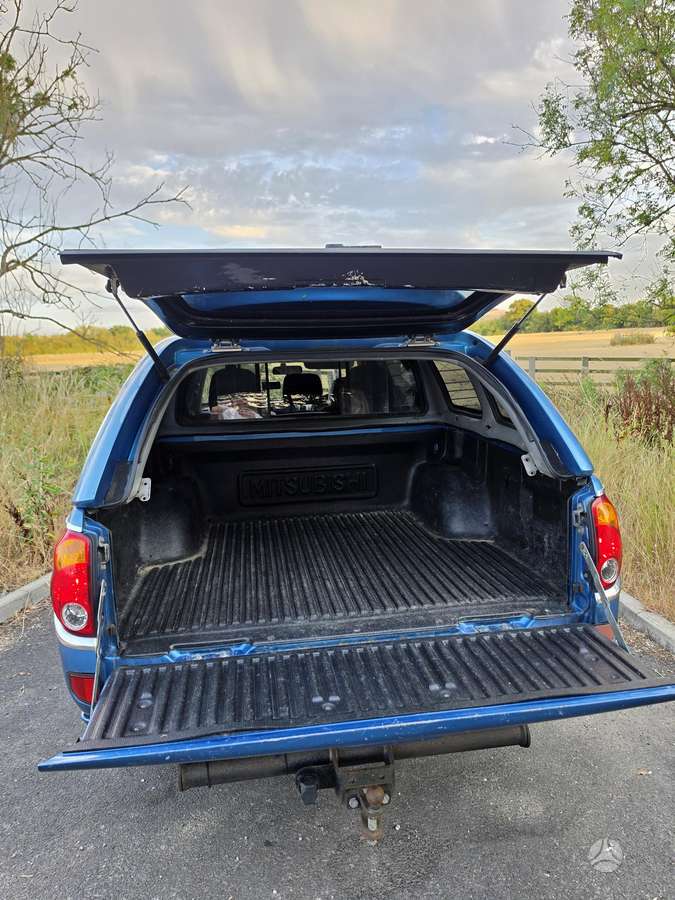 Mitsubishi L200 2008 — photo 9