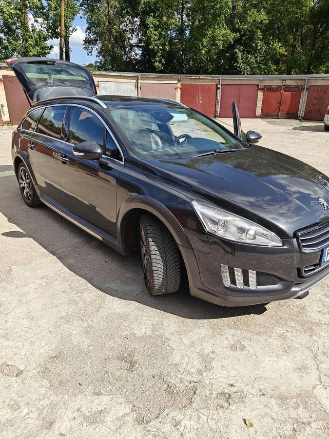 Peugeot 508 2014 — вигляд ззаду