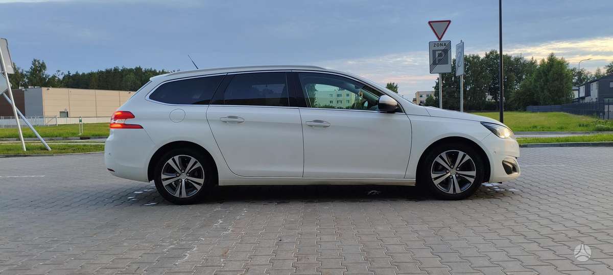Peugeot 308 2015 — photo 17