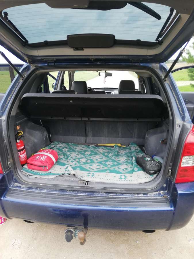Hyundai Tucson 2004 — engine 1991 cm³, 113 HP (83kW)