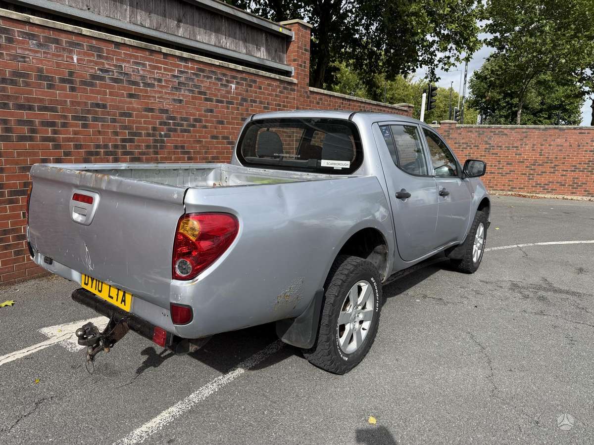 Mitsubishi L200 2010 — photo 5