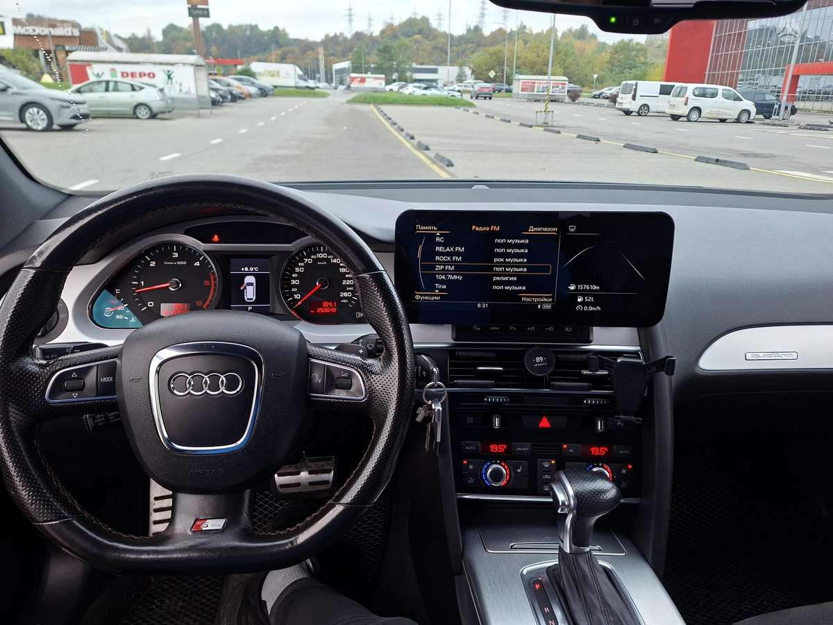 Audi A6 2009 — photo 9