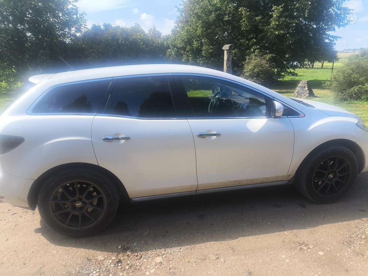 Mazda CX-7 2011 — engine 2184 cm³, 173 HP (127kW)