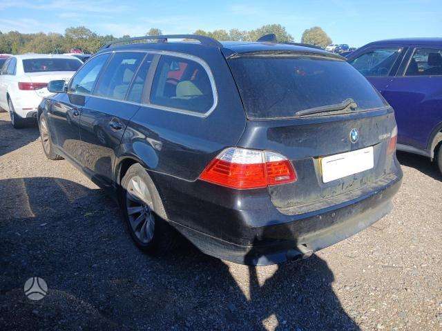 BMW 530 2009 — rear view