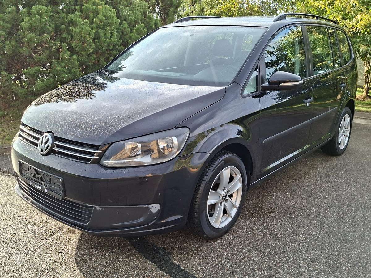 Volkswagen Touran 2011 — фото 6