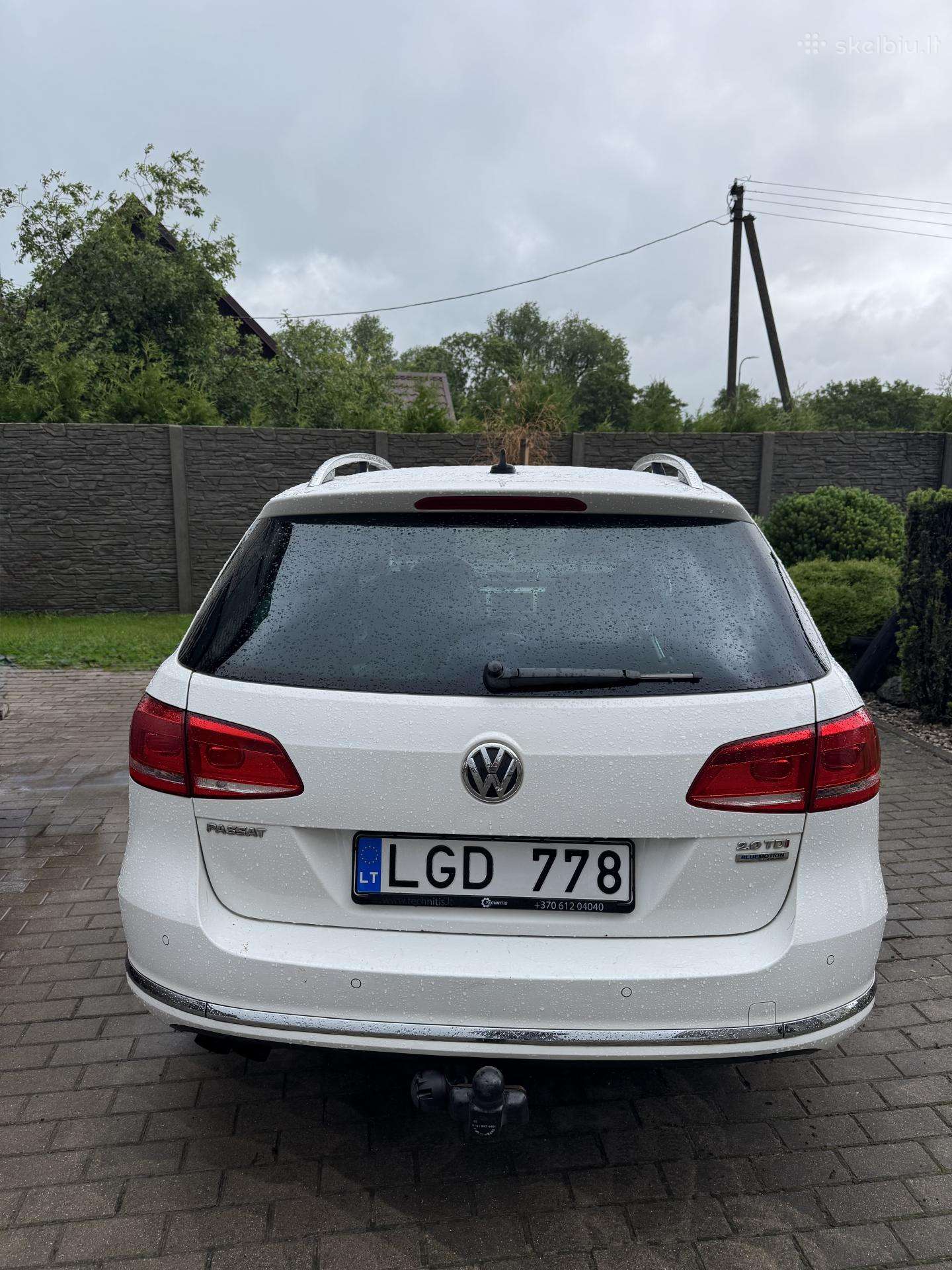 Volkswagen Passat 2013 — вигляд ззаду