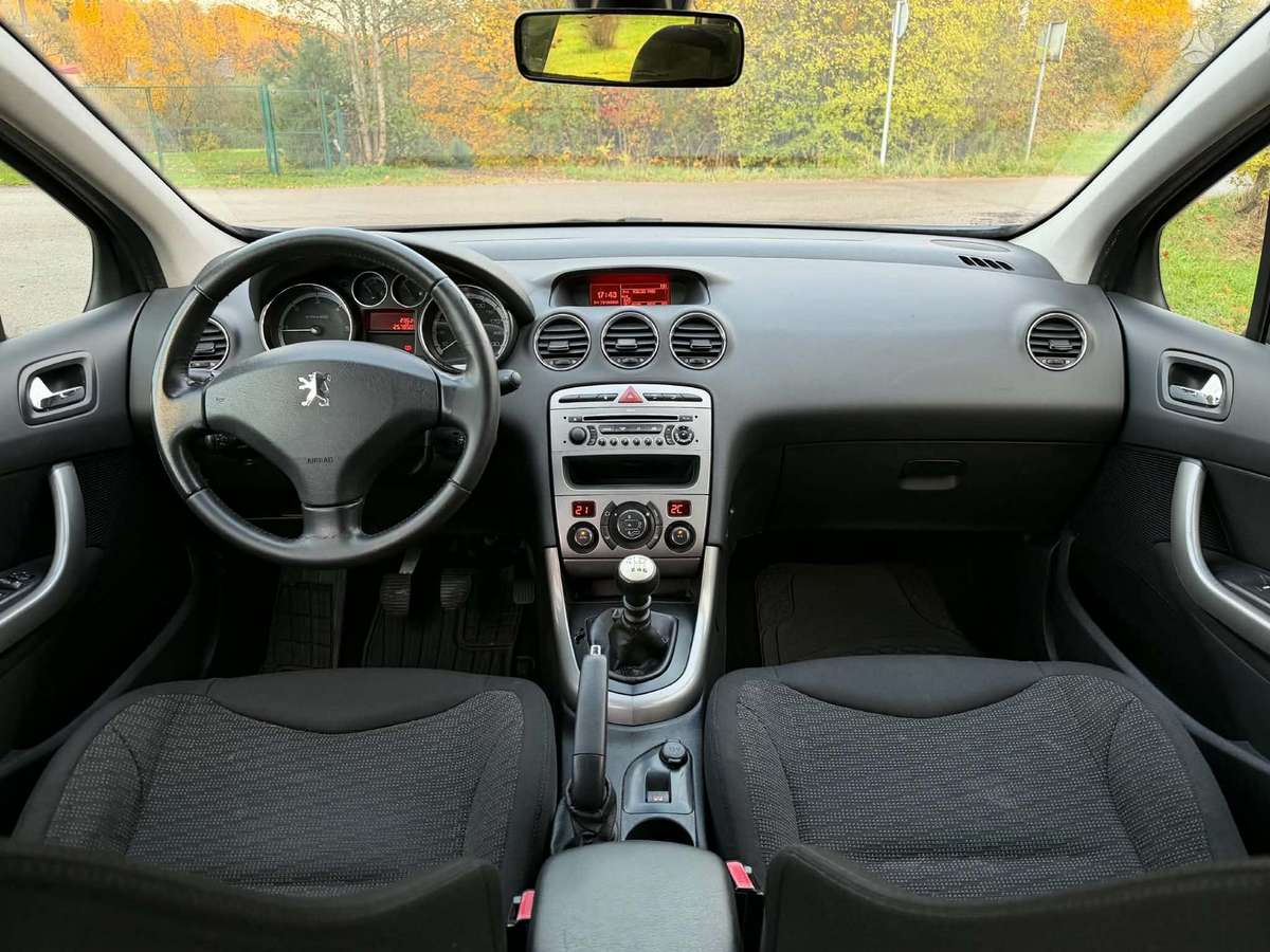 Peugeot 308 2009 — photo 11