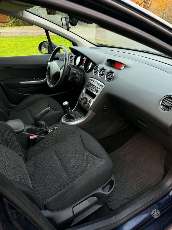 Peugeot 308 2009 — photo 15