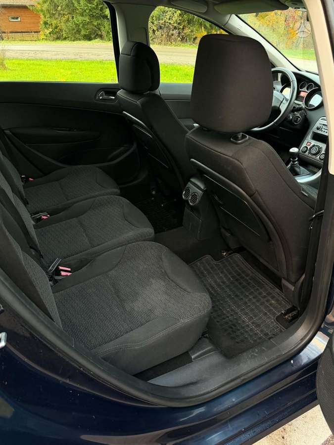 Peugeot 308 2009 — photo 21