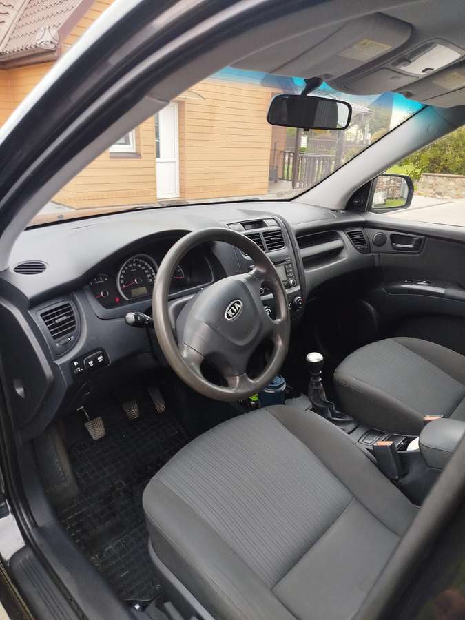 Kia Sportage 2010 — фото 17