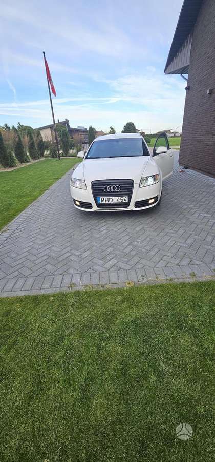 Audi A6 2009 — салон