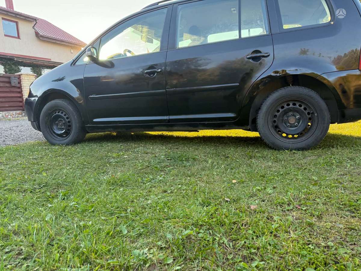 Volkswagen Touran 2004 — engine 1896 cm³, 105 HP (77kW)
