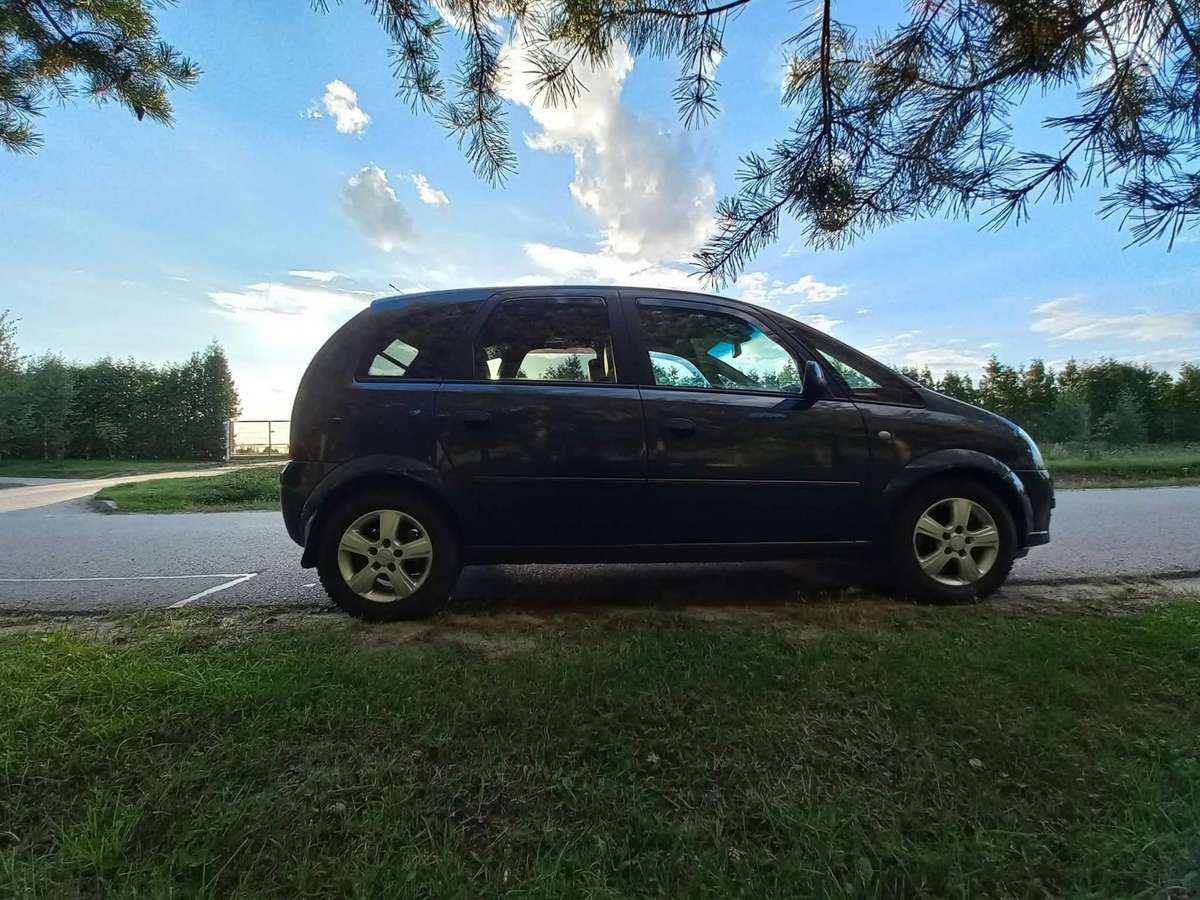 Opel Meriva 2009 — photo 14