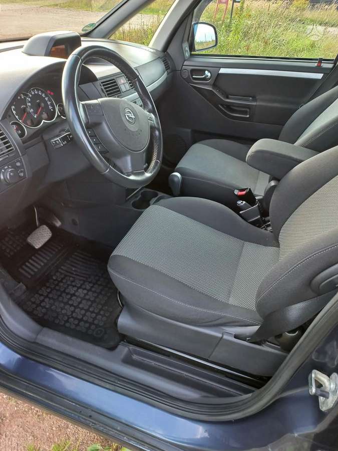 Opel Meriva 2009 — photo 16