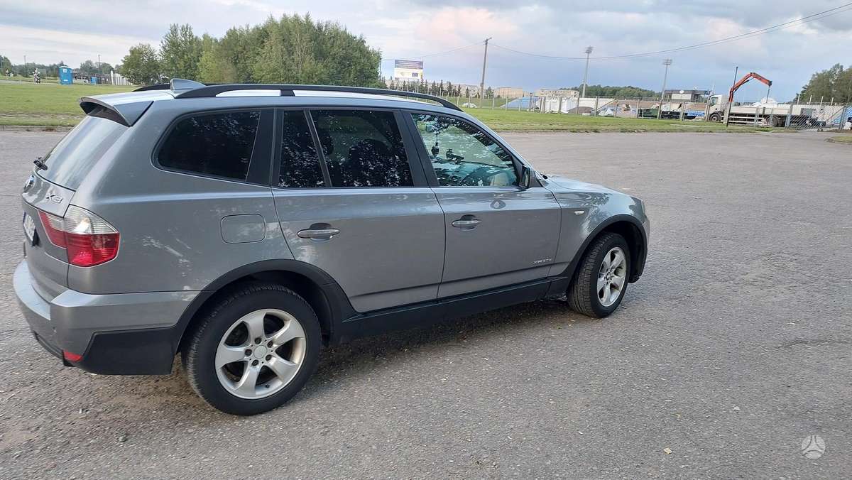 BMW X3 2009 — rear view