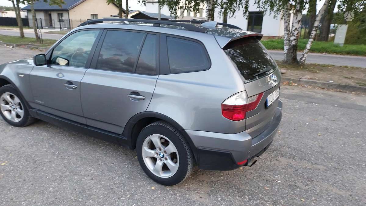 BMW X3 2009 — interior