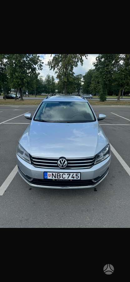 Volkswagen Passat 2013 — вигляд ззаду