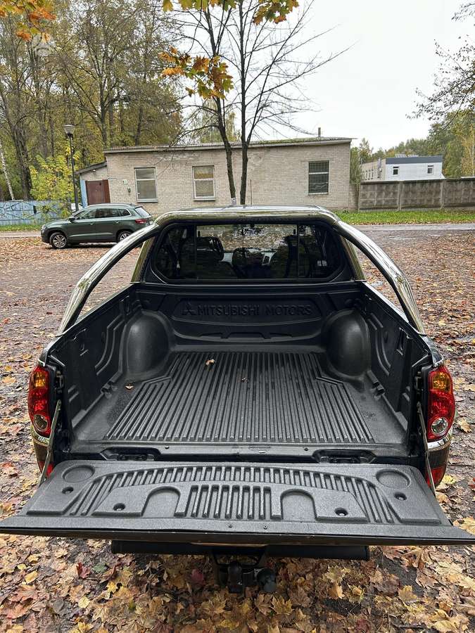 Mitsubishi L200 2006 — photo 9