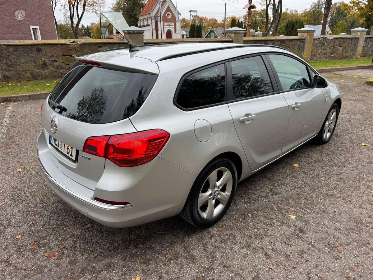 Opel Astra 2015 — фото 5