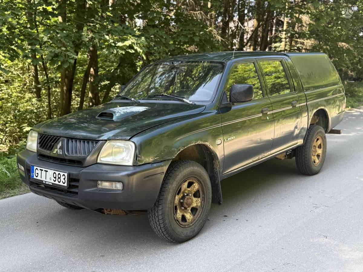 Mitsubishi L200 2006 — engine 2500 cm³, 116 HP (85kW)