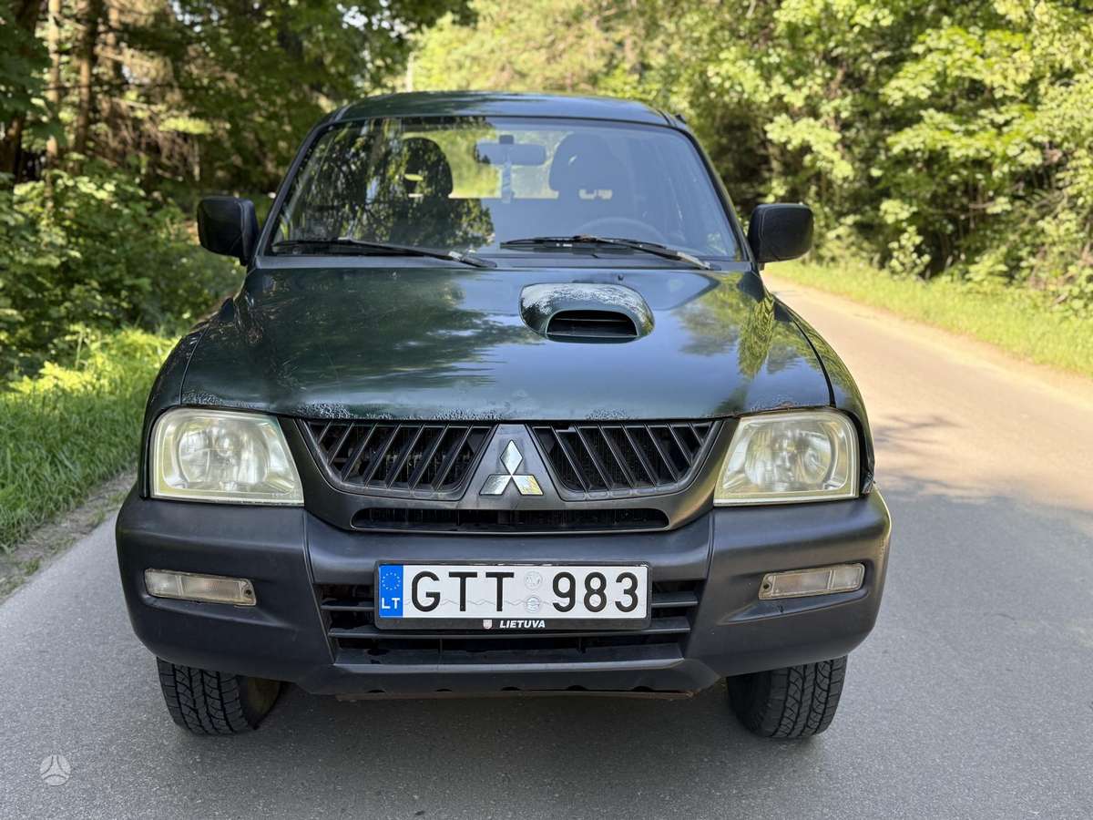 Mitsubishi L200 2006 — photo 5