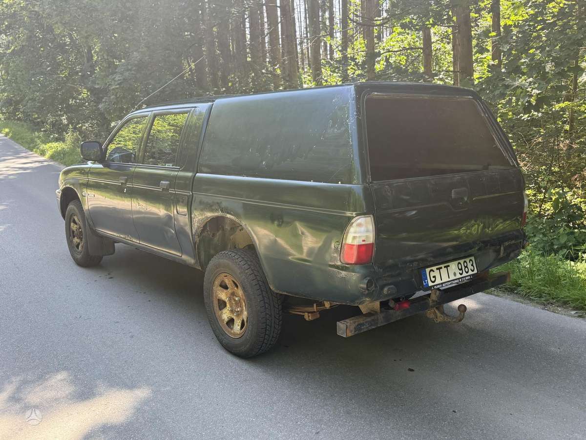 Mitsubishi L200 2006 — photo 6