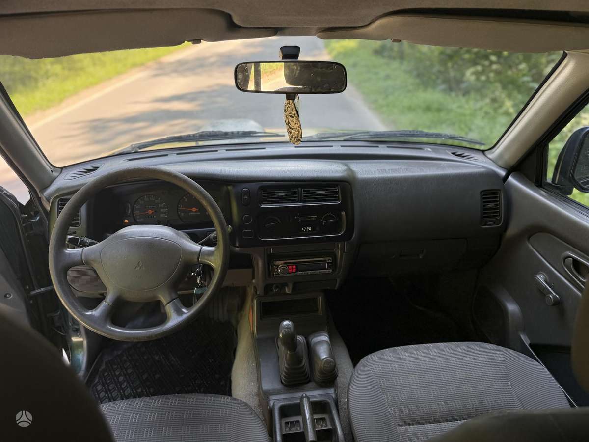 Mitsubishi L200 2006 — photo 8