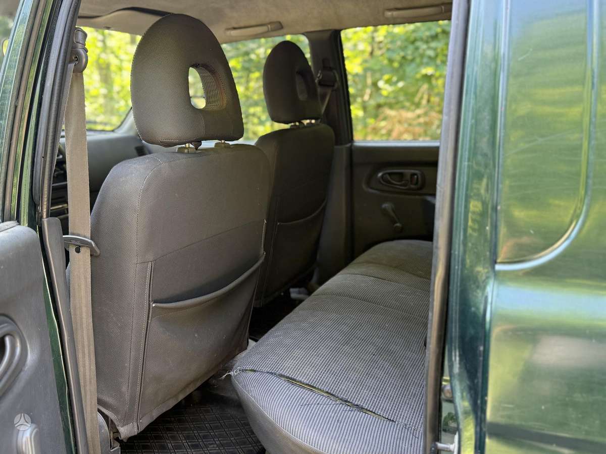 Mitsubishi L200 2006 — photo 9
