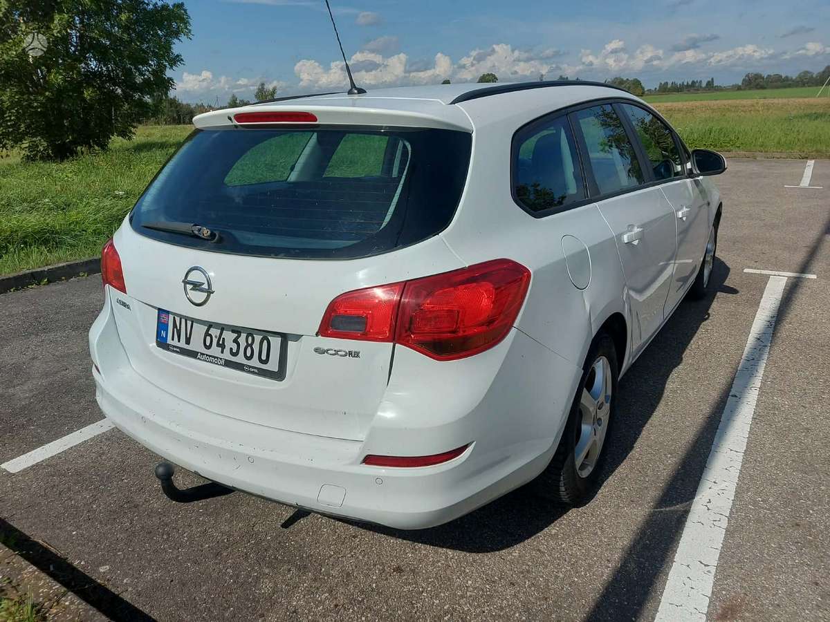 Opel Astra 2012 — engine 1300 cm³, 95 HP (70kW)