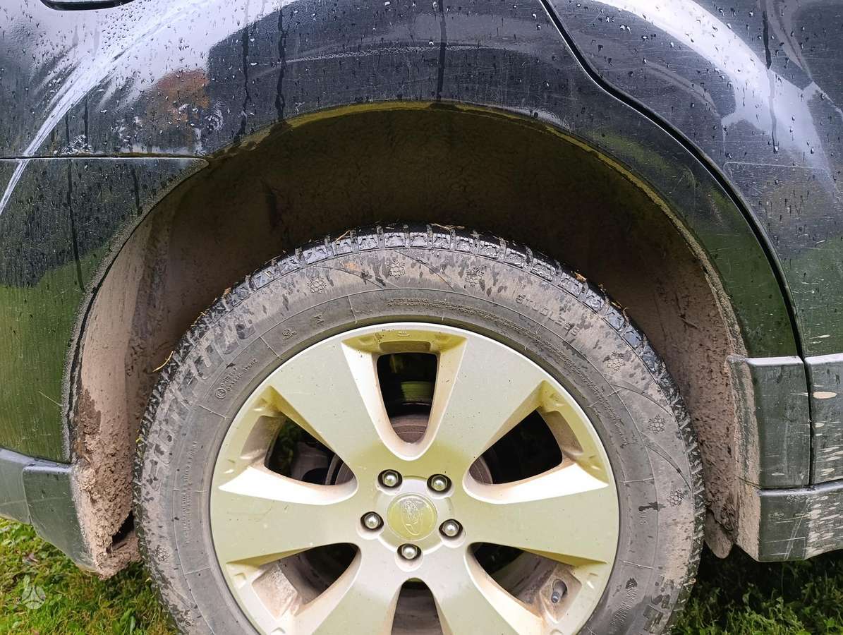 Subaru Outback 2011 — photo 21